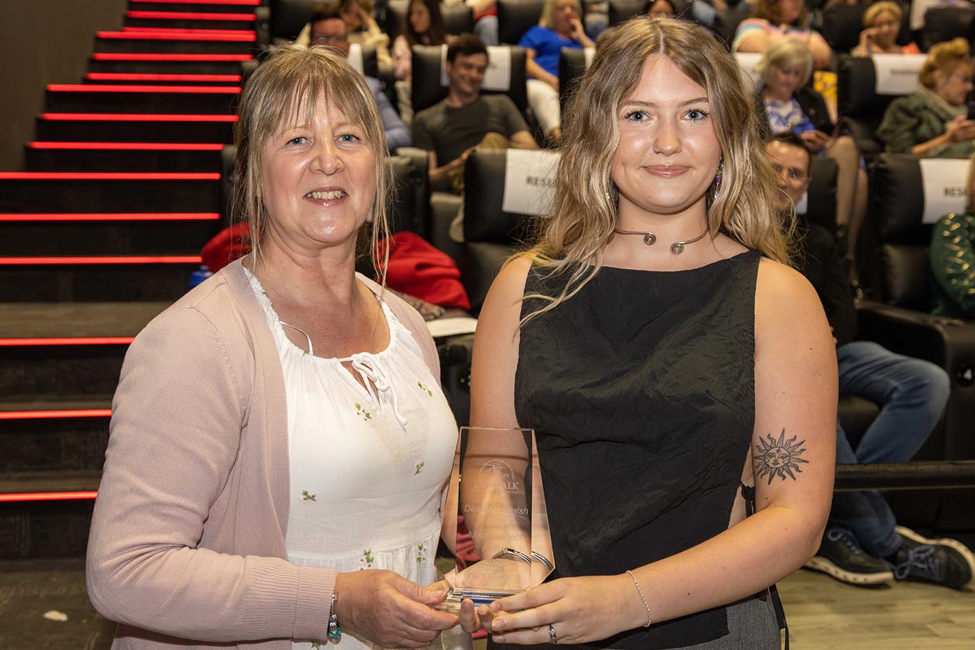 Wendy Baugh (Blackmagic Design) presenting a DkIT award to Jessica Doherty