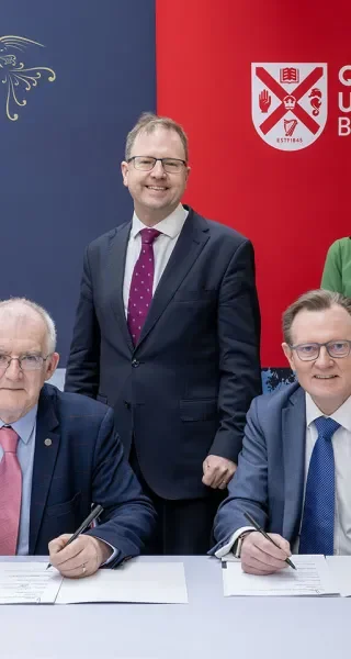 Representatives of the HEA and DFHERIS at the signing of the Heads of Agreement