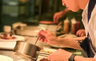 Eli adding the final touches to a dish in the Powerscourt kitchen