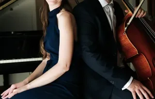 Sonas Duo posing for photograph with instruments