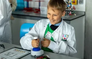 A pupil from St. Patrick's NS, Stamullen preparing teddy's blood for testing in the lab