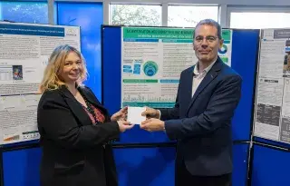 James Lonergan, Educational Officer at the Society of Chartered Surveyors Ireland (SCSI) presents Niamh Irish with her award