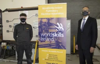Electrical Installations Competition Winner Damien Flynn with DkIT President Michael Mulvey