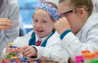 Eager young students get busy learning in the labs
