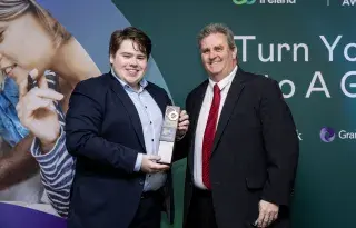 Max Crinion-Morgan presented the Higher Achieving Merit Award by Richard O'Connor Cruickshank                                                                                                           Photo by Fintan Clarke, Coalesce Photogr