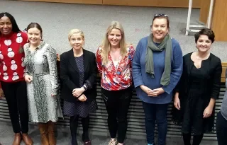 Photo shows lecturers from the School of Business and Humanities and the Society Research Group with Guest Lecturer Michelle Martyn