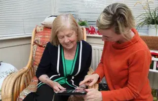 May Nevin, resident of Blackrock County Louth using SIMS platform on iPad which was developed by NetwellCASALA as part of the ProACT EC Horizon 2020 project. 