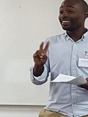 UCL Postgraduate student Jonathan James presenting his paper