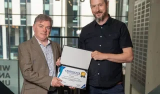 JJ-Quinlan-receiving-his-reward-from-Barry-McAdam-UCD-Innovation-Academy-Manager-2.jpg