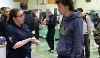 A representative from Mercury Engineering discussing opportunities at the DkIT Careers Fair