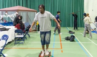 Students trying out some of the Circus Art Society activities