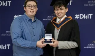 Sean Wallace from Timoney presenting the medal to Shane Moran