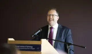 Minister Lawless speaking at the formal endorsement of the Heads of Agreement between DkIT and Queen's