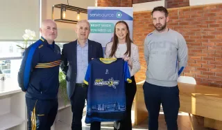 Brian Og Corr and Derek Crilly with representatives from Servisource