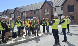Students learning about the progress at Bayview