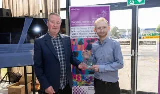 Tadhg Brady who won the Best Project Award for Computing Systems and Operations with Bence Veres