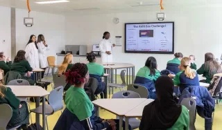 Darren Agulona, Oluwaseyi Folorunsho and Malaykah Jamal, delivering DkIT’s Science in a Box Programme to TYs from St Louis