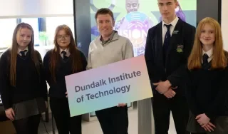 Diarmuid Cahill pictured with Students from Shimna Integrated College