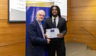 Elevate Award winner Darren Agulonu with president Dr Diarmuid O'Callaghan