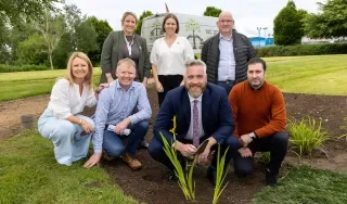 Opening the conference, Minister Christopher O’Sullivan planted an iris in DkIT’s raingarden.