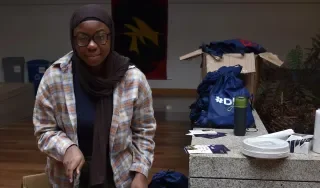 Rahamat Kako (former CoderDojo Ninja) who made the cake she is cutting