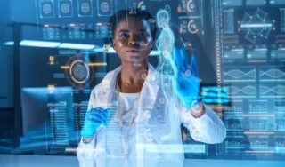 Doctor looking through holographic medical data