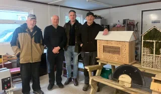 Ben McCabe, pictured with members of the Carrickmacross Men's Shed Pearse Callan, Frank Ward, and Hugh Crawley