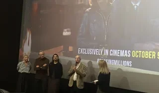 Sarah McCann completing a Q and A with the stars of Chasing Millions