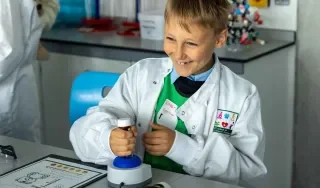 A pupil from St. Patrick's NS, Stamullen preparing teddy's blood for testing in the lab