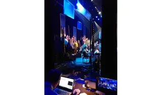 Backstage photo of DkIT performing