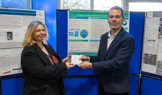 James Lonergan, Educational Officer at the Society of Chartered Surveyors Ireland (SCSI) presents Niamh Irish with her award