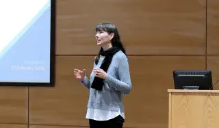 Charlotte Byrne, Education Officer with the Irish Refuge Council, speaks to the gathering in the Whitaker Theatre at DkIT