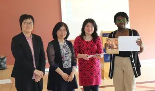 Ms Zhu Xikun , Ms Wang Lihong, Ping Cao and student