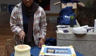 Rama Olajuwon (former CoderDojo Ninja) who made the cake she is cutting