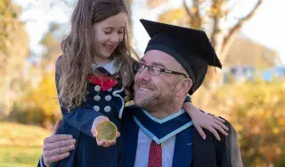 Media Arts and Technologies graduate Gussy Hughes from Emyvale, Co Monaghan pictured with his daughter Zoe (7) at his conferring at Dundalk Institute Of Technology (DkIT) Gussy also recieved the Presidents Prize for Academic Excellence
