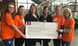 DkIT 4th year student nurses Emma Maguire, Sinead Sheehy, Lara Cummins, Lisa Moran and Elaine Flanagan presenting a cheque to Paula Dowdall of the Maria Goretti Foundation