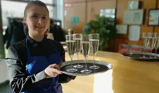 One of the Hospitality Management students at DkIT, waiting to greet guests at DkITCHEN 2019