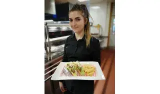 One of the Hospitality Management students at DkIT, ready to bring food orders to waiting guests in the DkITCHEN 2019