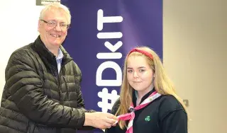 Dr Tom Dooley, Head of School of Engineering presenting Niamh Rogers with her Senior Branch enrolment pin
