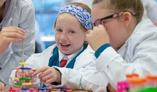 Eager young students get busy learning in the labs
