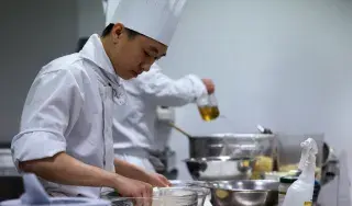 One of our talented Culinary Arts student taking part in the healthy cooking demonstration.