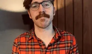 Mark JD Smyth was recently selected as a scholar for an Atticus Education