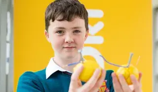 Pictured: Sam Ryan, student at Ashbourne Community School, displaying his project studying the ‘Chemical energy of a battery powered by Fruit’