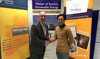 Pictured (L-R): Judge Barry Hyland pictured with competition winner Durlav Pun
