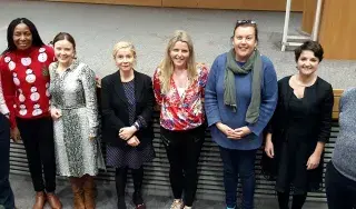 Photo shows lecturers from the School of Business and Humanities and the Society Research Group with Guest Lecturer Michelle Martyn