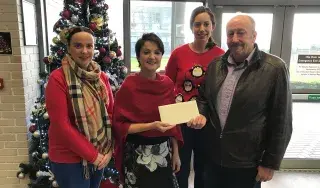 Pictured left to right: Ms. Bernie O'Hara, DkIT Chaplain; Dr. Bernadette Brereton of the DkIT WELCOME College of Sanctuary team; Dr. Annaleigh Margey, DkIT History Lecturer; presenting our donation to Mr. Robbie Hyslop, Manager of Carroll Village, Louth