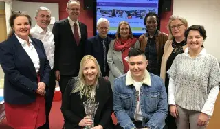 Front and centre, Dayna Branigan and Gareth Lau, showcasing their award with DkIT President Michael Mulvey, DkIT Lecturers from the School of Business and Humanities, as well as Dayna’s parents Desmond Branigan, Petria Branigan.