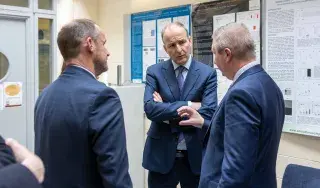 Tánaiste Michéal Martintalks to Prof Fergal McCaffrey, Head of School of Informatics and Creative Arts and Dr. Tim McCormac, Head of Research