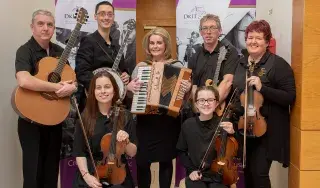  Members of the Oriel Traditional Orchestra including the directors Noreen Morgan McManus (DkIT fiddle tutor), Dr Adèle Commins (Head of Department of Creative Arts, Media and Music), Róisín Ward Morrow and Dr Daithí Kearney (Co-Director, Creative Arts Research Centre).