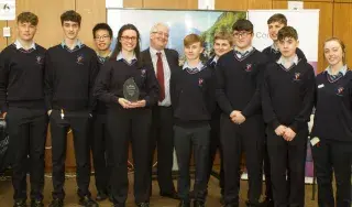 The overall winners of the competition formed a winning alliance pictured here is Our Lady’s Castleblaney, Co. Monaghan with Bob McKiernan Head of School of Informatics and Creative Arts.